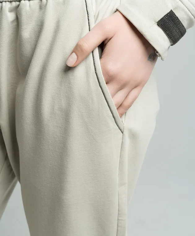 Brunello Cucinelli Beige pants with monil chain
