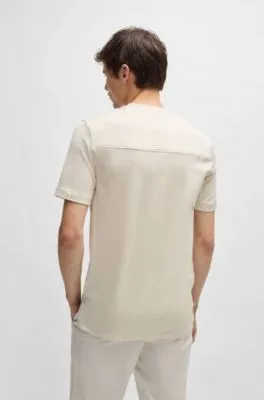 Camiseta regular fit en tejido antidesgarros de algodón con ribetes lisos