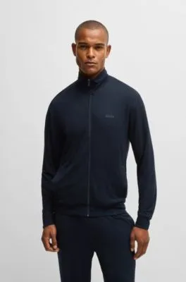 Chándal relaxed fit en tejido elástico con detalles de logo