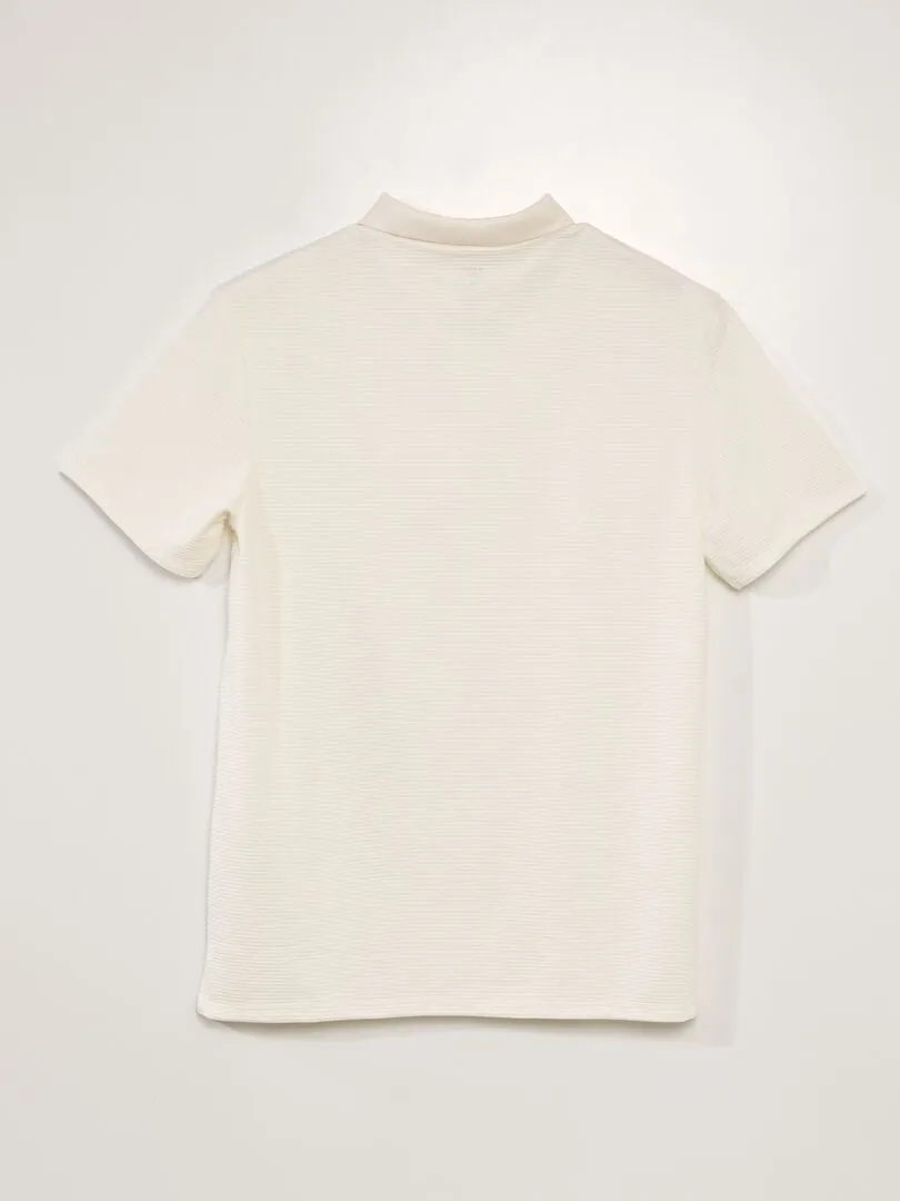 POLO CON CUELLO CON CREMALLERA DE PUNTO CON TEXTURA  BLANCO
